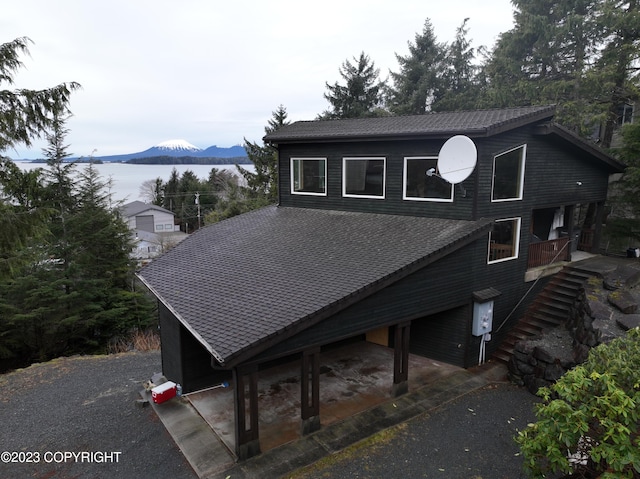 view of front of home with a mountain view