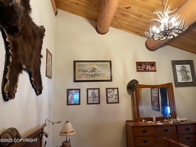 interior space featuring wooden ceiling, vaulted ceiling with beams, and a chandelier