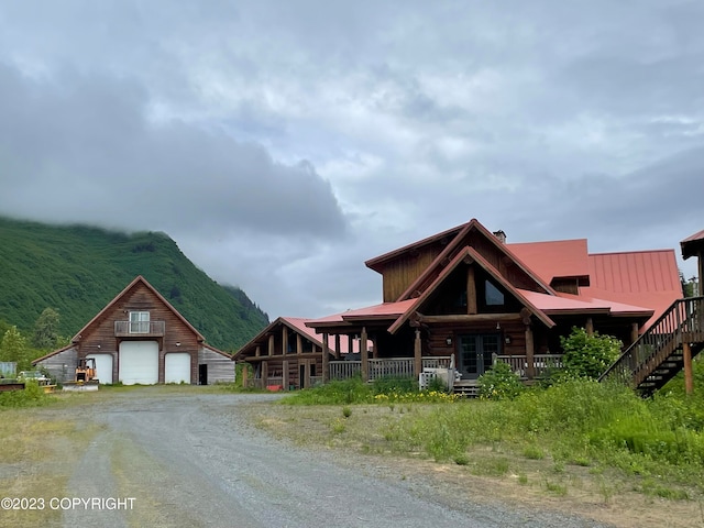 log home with covered porch