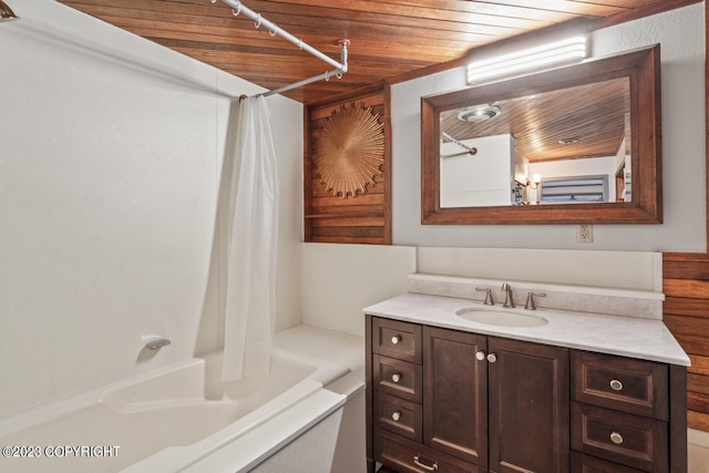 bathroom with wood ceiling, shower / bathtub combination with curtain, and large vanity