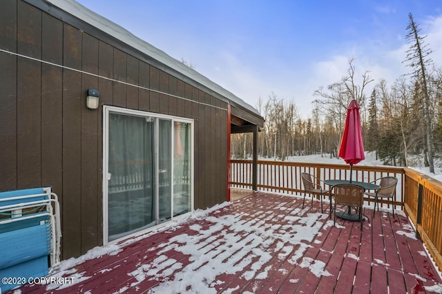 view of snow covered deck