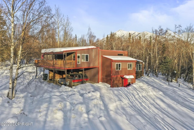 view of snow covered property