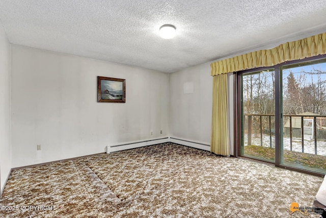 carpeted spare room featuring a textured ceiling