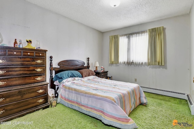 bedroom featuring a baseboard radiator, carpet, and a textured ceiling