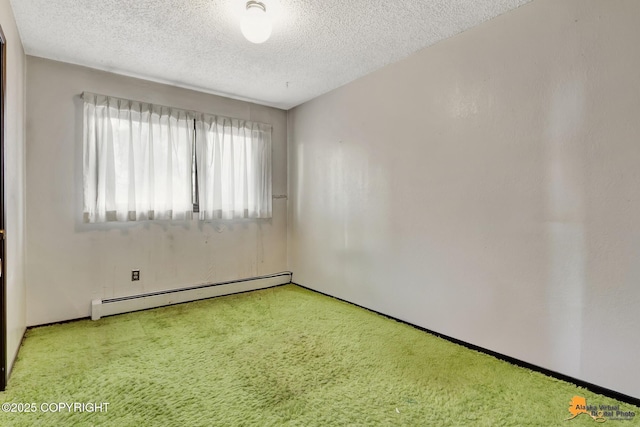 empty room featuring a baseboard heating unit, a textured ceiling, and light colored carpet