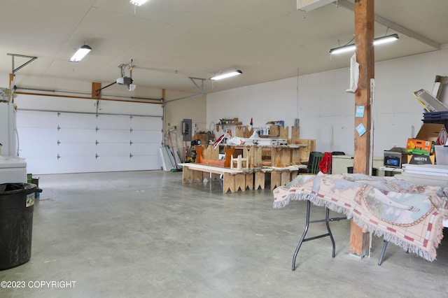 garage featuring a garage door opener