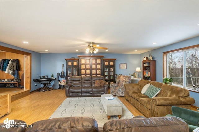 living room with recessed lighting, wood finished floors, and ceiling fan