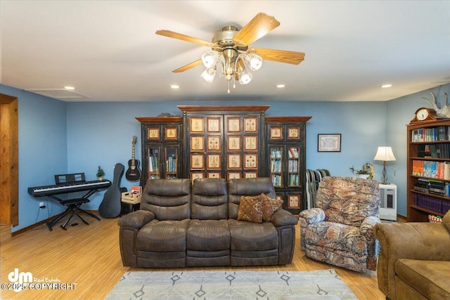 living room featuring ceiling fan, wood finished floors, and recessed lighting