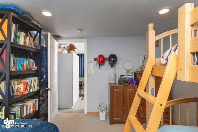 carpeted bedroom featuring recessed lighting