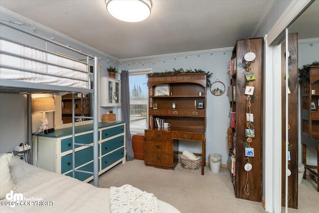 bedroom featuring carpet flooring and ornamental molding