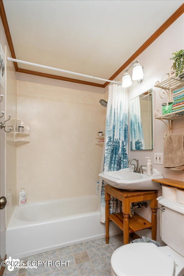 bathroom featuring toilet, shower / bath combo, and ornamental molding