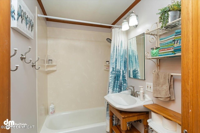 bathroom featuring vanity and shower / tub combo with curtain