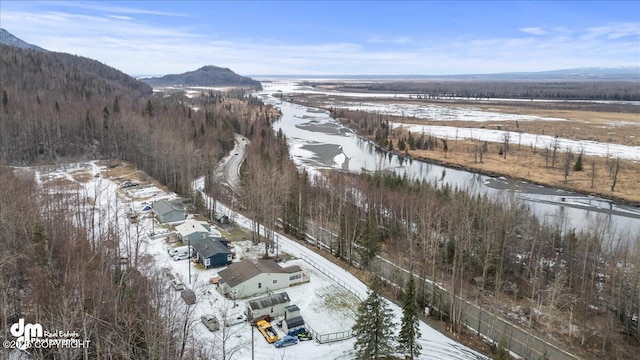 drone / aerial view with a water and mountain view