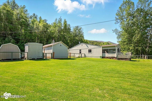 10833 E Twin Peaks Ct, Palmer, AK 99645 - view of yard featuring a storage shed