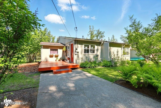 10833 E Twin Peaks Ct, Palmer, AK 99645 - view of front of house with a wooden deck