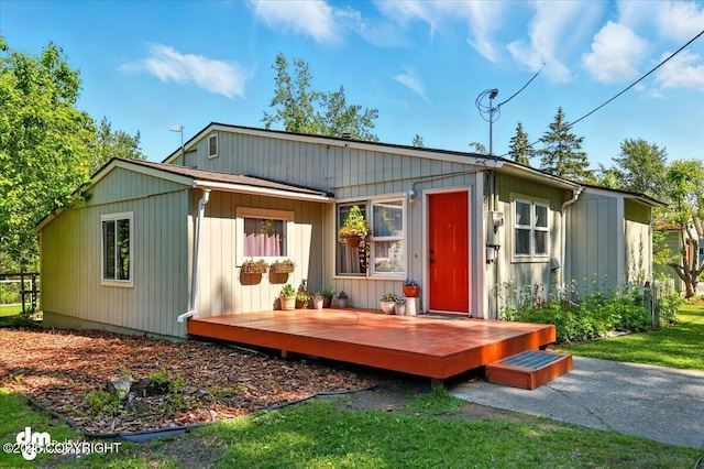 10833 E Twin Peaks Ct, Palmer, AK 99645 - view of front of property with a wooden deck