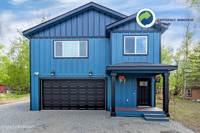 view of front of property with an attached garage, driveway, a shingled roof, and board and batten siding