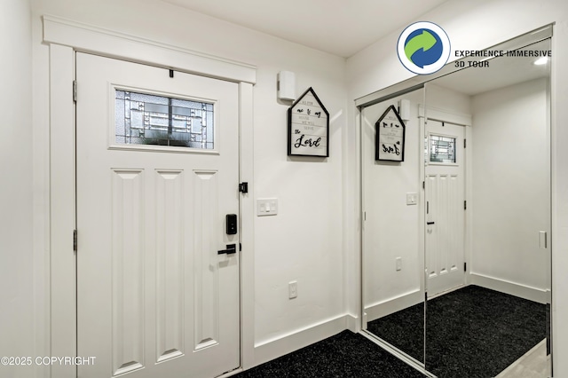 foyer with baseboards