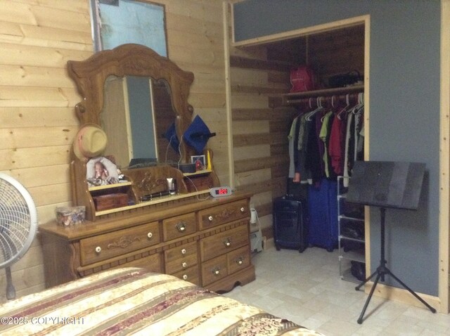 1832 Nerka Loop, Dillingham, AK 99576 - bedroom with wood walls, a closet, and light flooring