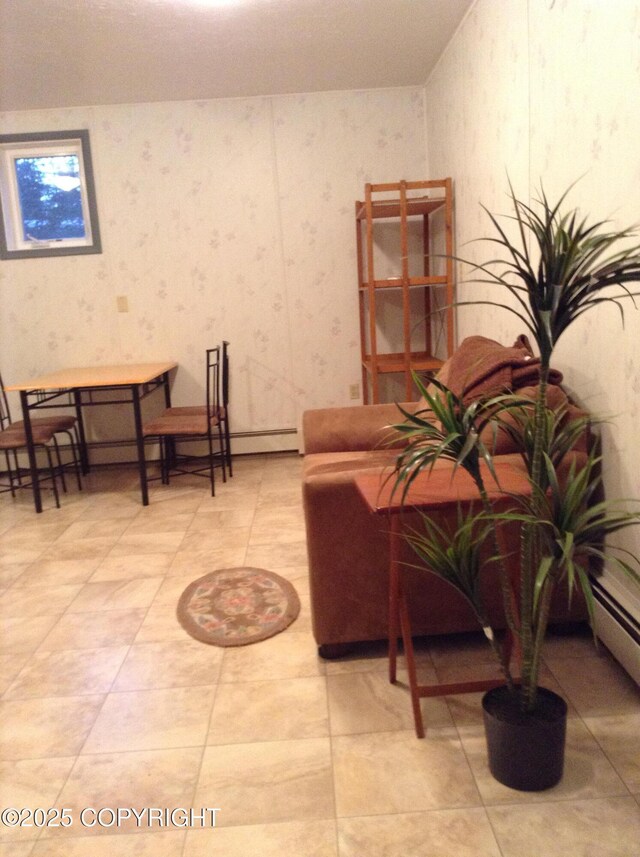 1832 Nerka Loop, Dillingham, AK 99576 - living area featuring wallpapered walls and baseboard heating