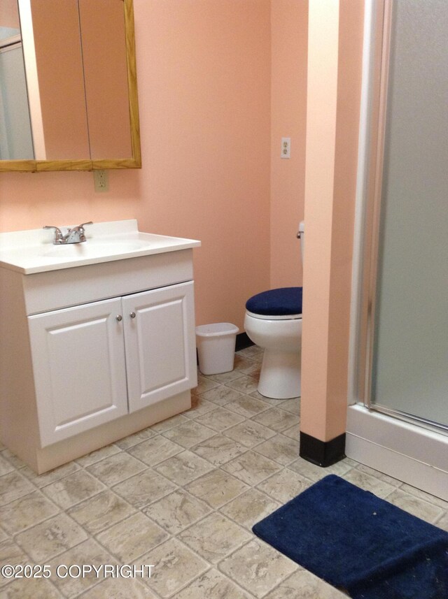 1832 Nerka Loop, Dillingham, AK 99576 - full bathroom featuring toilet, vanity, and a shower stall