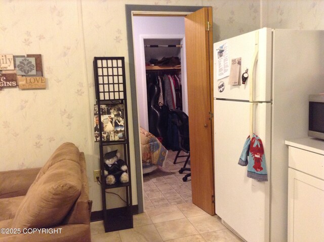 1832 Nerka Loop, Dillingham, AK 99576 - corridor with wallpapered walls and light tile patterned flooring