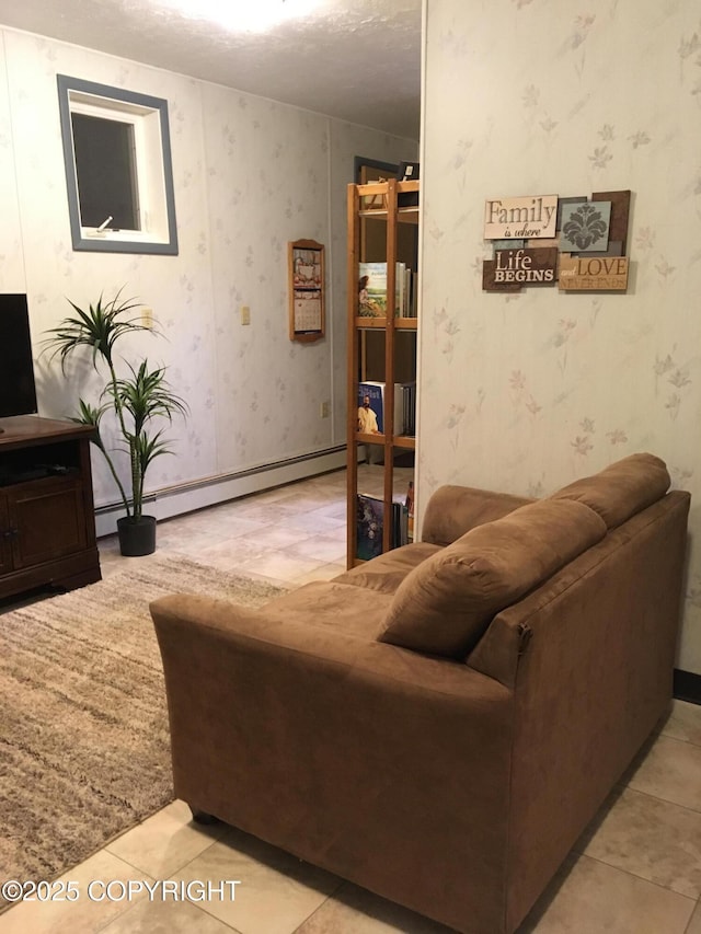1832 Nerka Loop, Dillingham, AK 99576 - living area featuring baseboard heating, wallpapered walls, and tile patterned floors