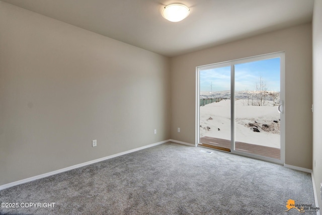 5991 Takotna Loop, Anchorage, AK 99504 - carpeted empty room featuring baseboards