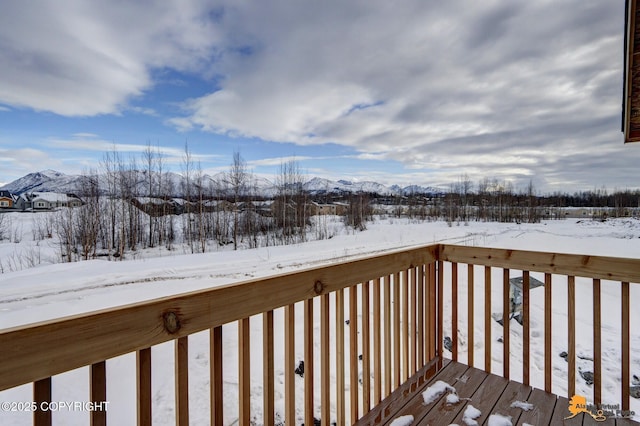 5991 Takotna Loop, Anchorage, AK 99504 - snow covered deck featuring a mountain view
