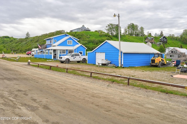 15264 Airport Ln, Ninilchik, AK 99639 - exterior space featuring an outbuilding, fence, and dirt driveway