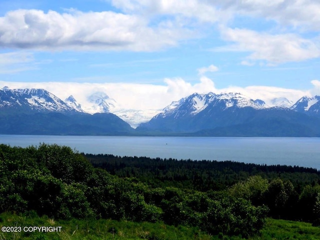 mountain view with a water view