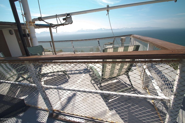 deck featuring a water view