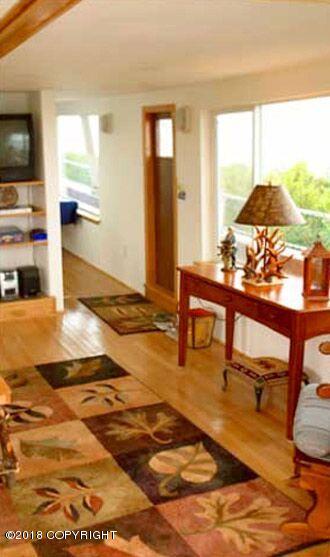 interior space featuring hardwood / wood-style flooring and a wealth of natural light