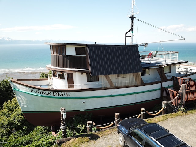 exterior space with a water view