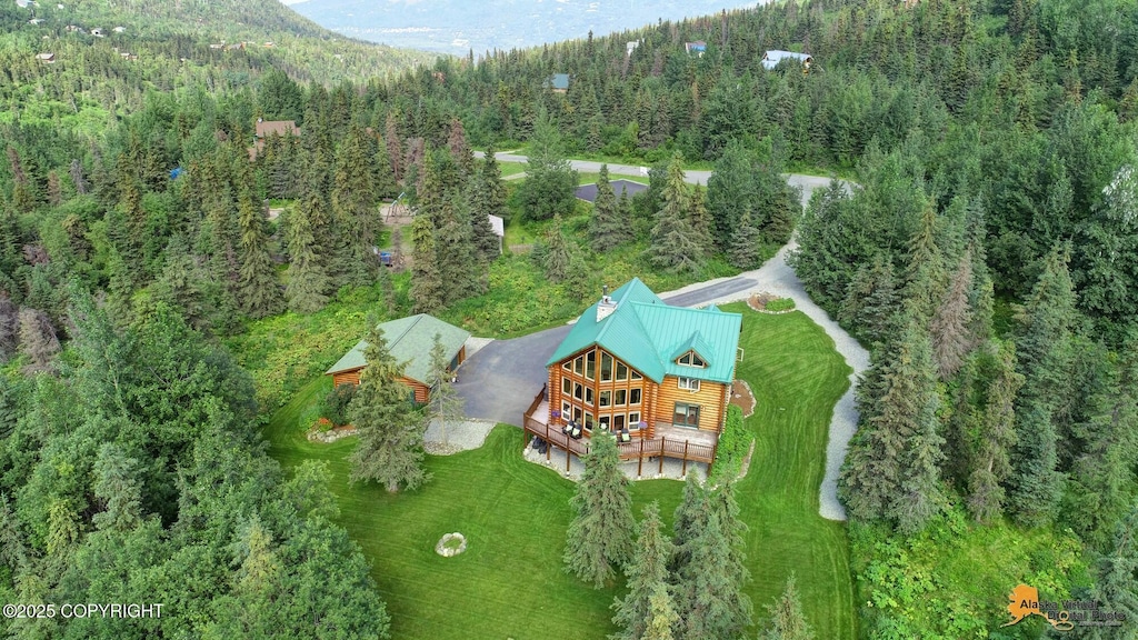 bird's eye view featuring a forest view
