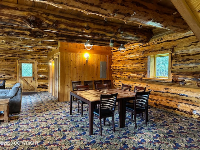 344 Eagle Bluff Dr, Haines, AK 99827 - dining space featuring electric panel, carpet, beamed ceiling, rustic walls, and wood ceiling