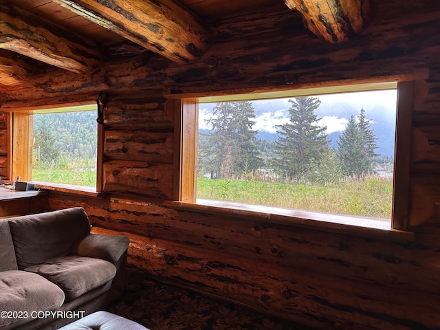 344 Eagle Bluff Dr, Haines, AK 99827 - living room with beam ceiling and rustic walls