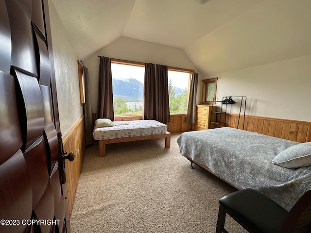 344 Eagle Bluff Dr, Haines, AK 99827 - bedroom featuring a wainscoted wall, carpet, lofted ceiling, and wood walls