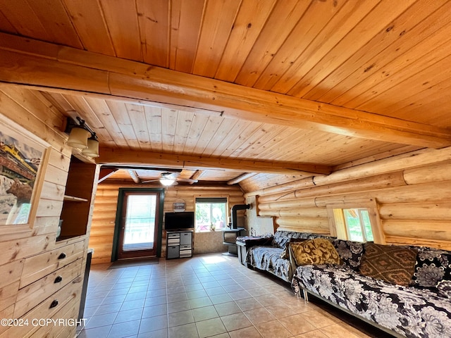 unfurnished living room featuring wood ceiling, tile patterned floors, beam ceiling, and rustic walls