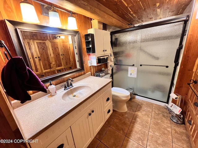 bathroom with wood ceiling, tile patterned flooring, vanity, a shower with shower door, and wood walls