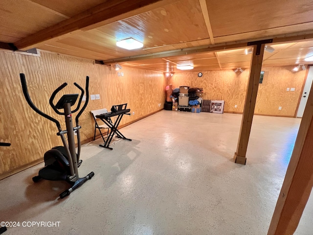 exercise area with wood walls