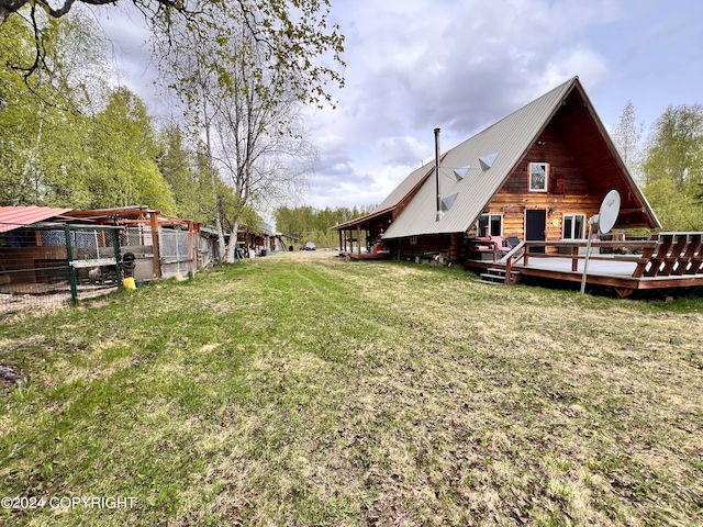 view of yard featuring a wooden deck