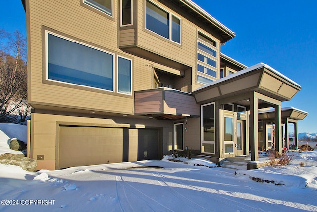 exterior space with a garage