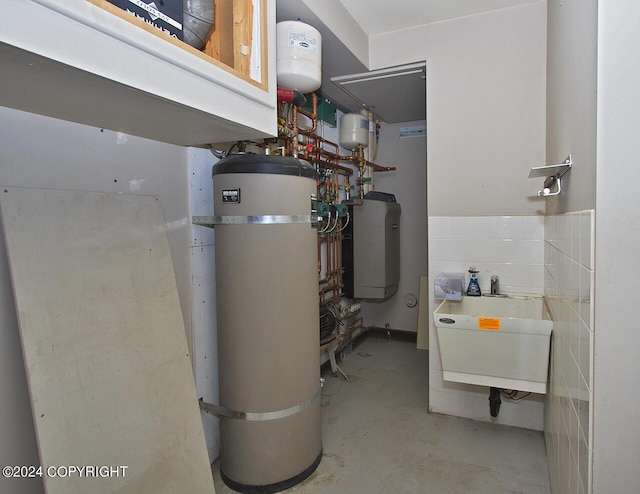 928 Quiet Creek Dr, Homer, AK 99603 - utilities with a sink and secured water heater