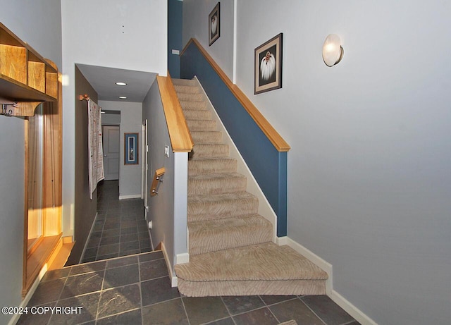 928 Quiet Creek Dr, Homer, AK 99603 - stairway featuring baseboards