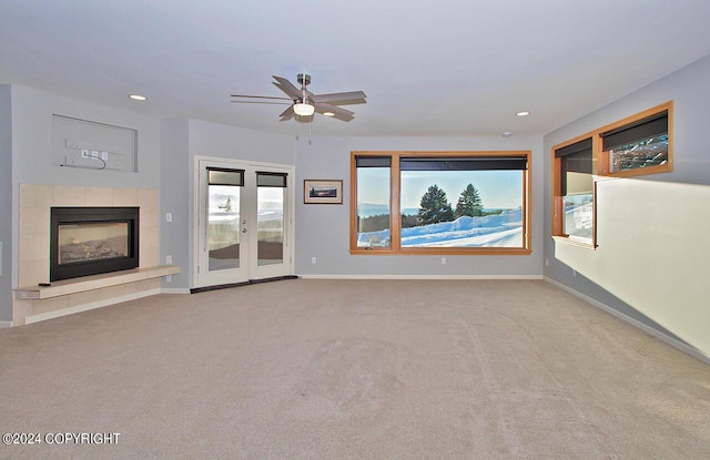 928 Quiet Creek Dr, Homer, AK 99603 - unfurnished living room with plenty of natural light, ceiling fan, carpet, baseboards, and recessed lighting