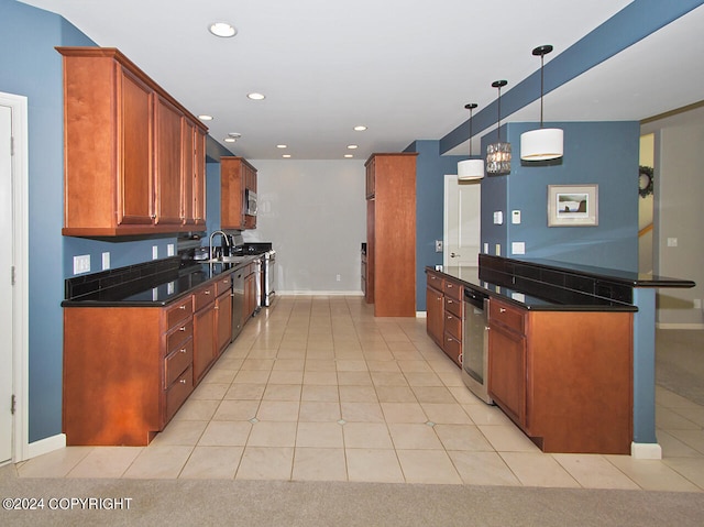 kitchen featuring hanging light fixtures, stainless steel stove, and light tile patterned floors