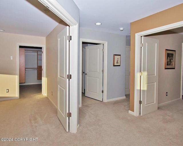 928 Quiet Creek Dr, Homer, AK 99603 - hallway with light carpet, baseboards, and recessed lighting