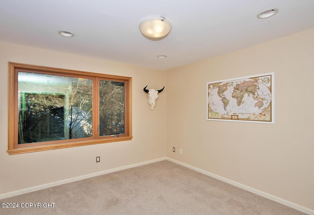 928 Quiet Creek Dr, Homer, AK 99603 - carpeted empty room with baseboards and recessed lighting