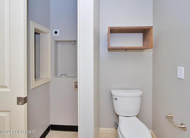 928 Quiet Creek Dr, Homer, AK 99603 - bathroom with toilet, baseboards, and tile patterned floors